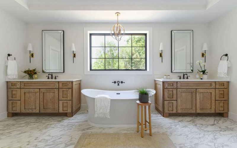 What elements give a luxurious bathroom a spa-like atmosphere